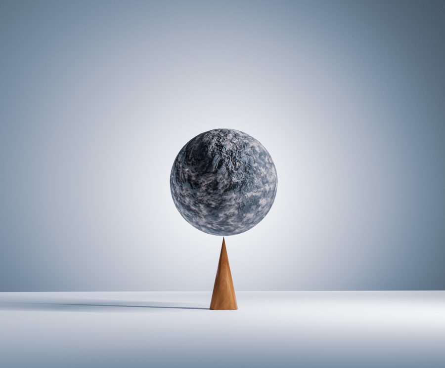 computer generated image of a stone sphere balancing perfectly on the tip of a wooden cone.