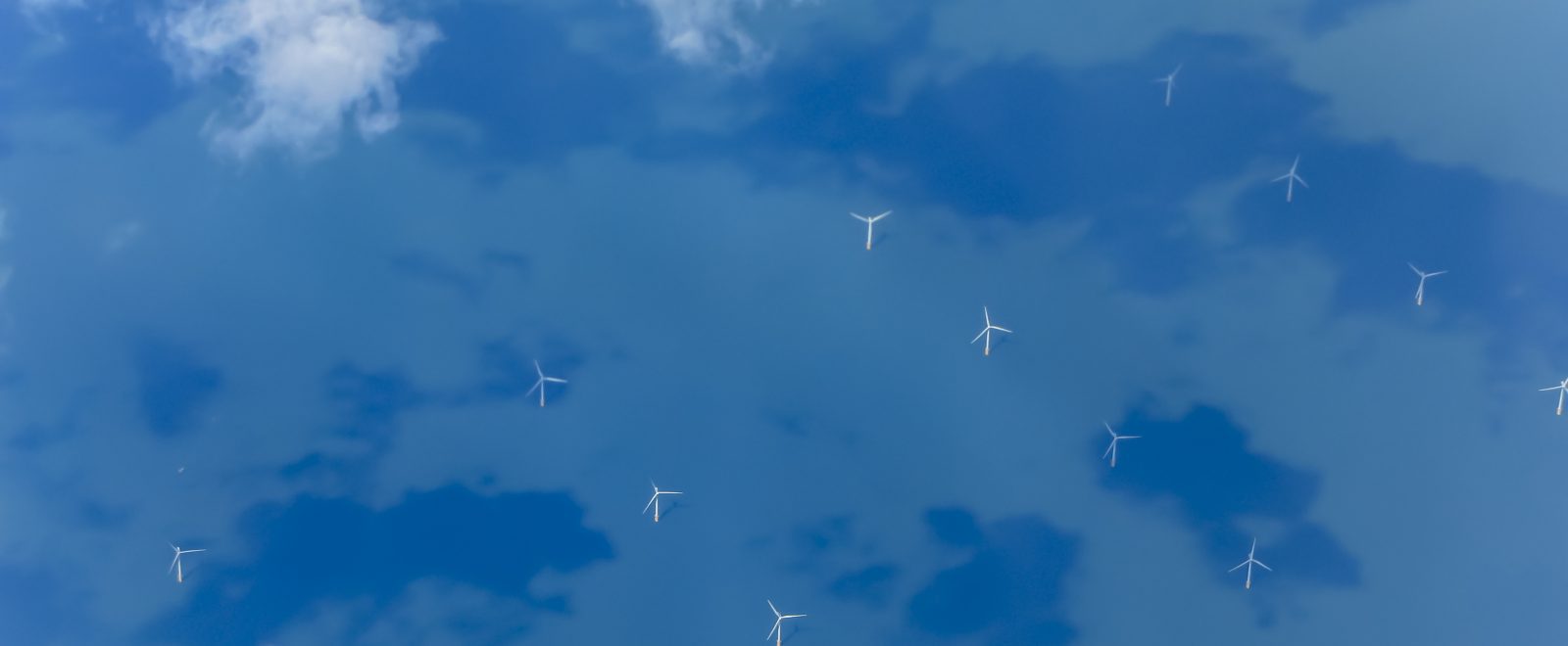 View of Wind Turbines Generating Electricity in English Channel from Aircraft