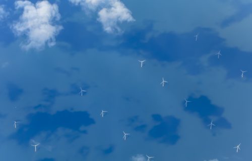 View of Wind Turbines Generating Electricity in English Channel from Aircraft