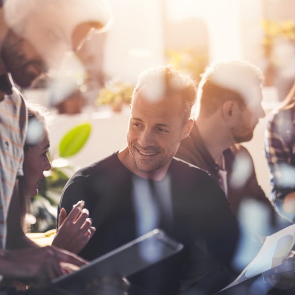 Business people connected on internet network with a tablet. concept of startup company. double exposure