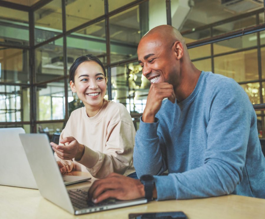 People working together with laptops