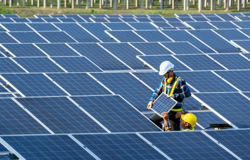 Team electrician installing solar panels working on alternative energy sources clean.