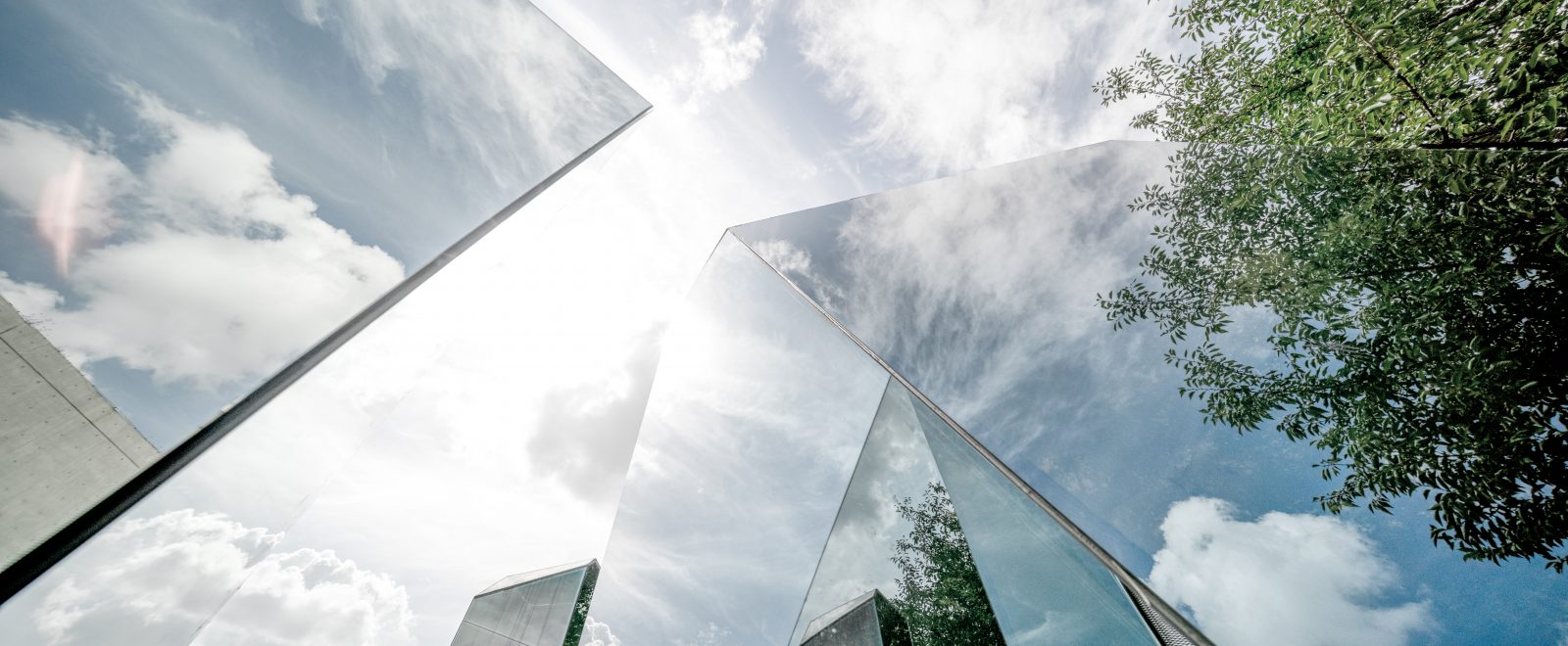 Urban landscape reflected by polyhedral glass