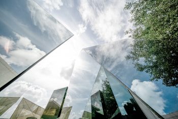 Urban landscape reflected by polyhedral glass