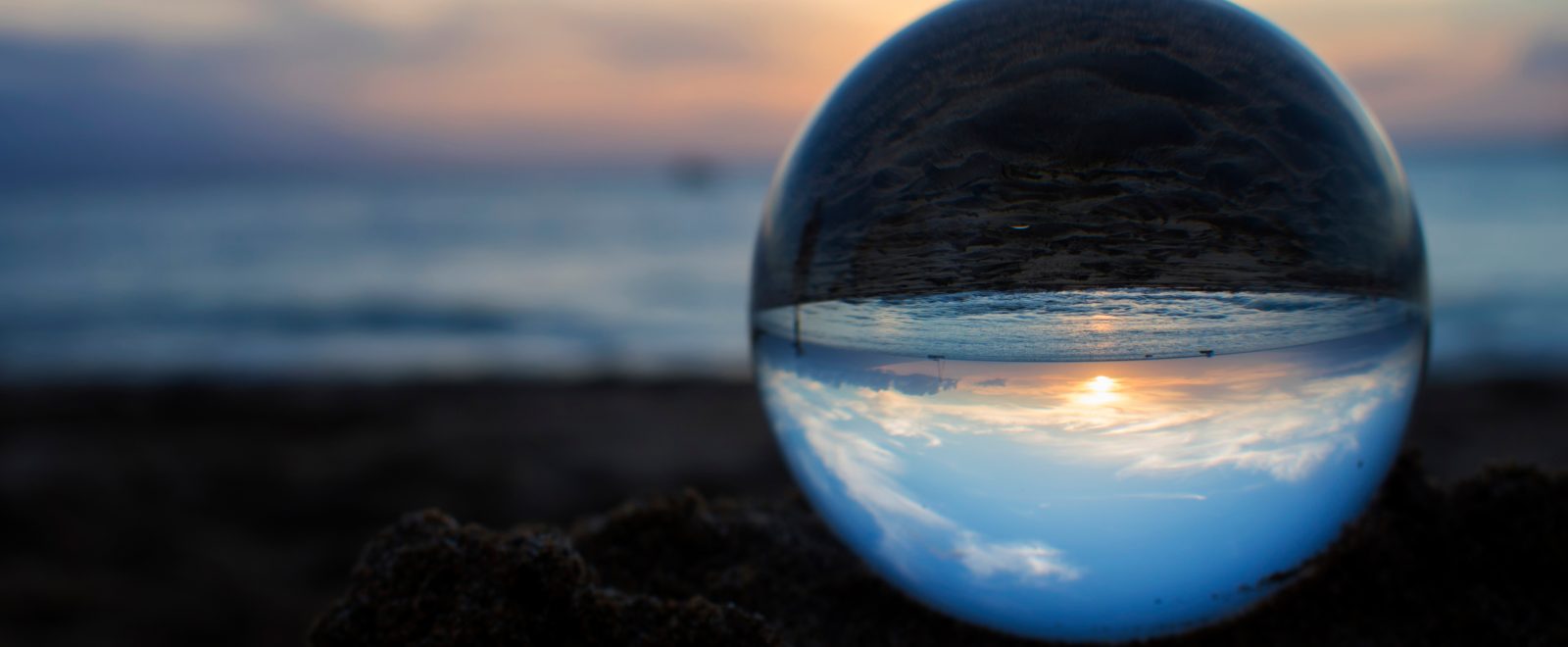 Sunset Captured in Glass or Crystal Ball on Beach