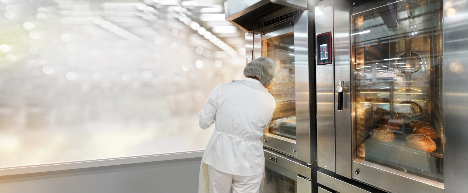 Commercial bread oven with a baker