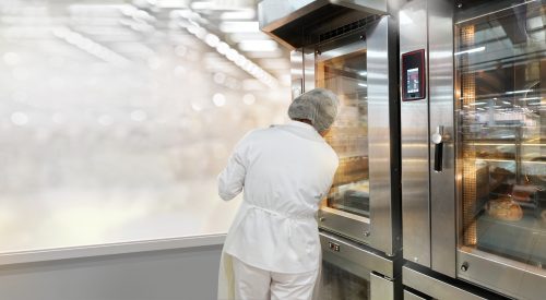 Commercial bread oven with a baker