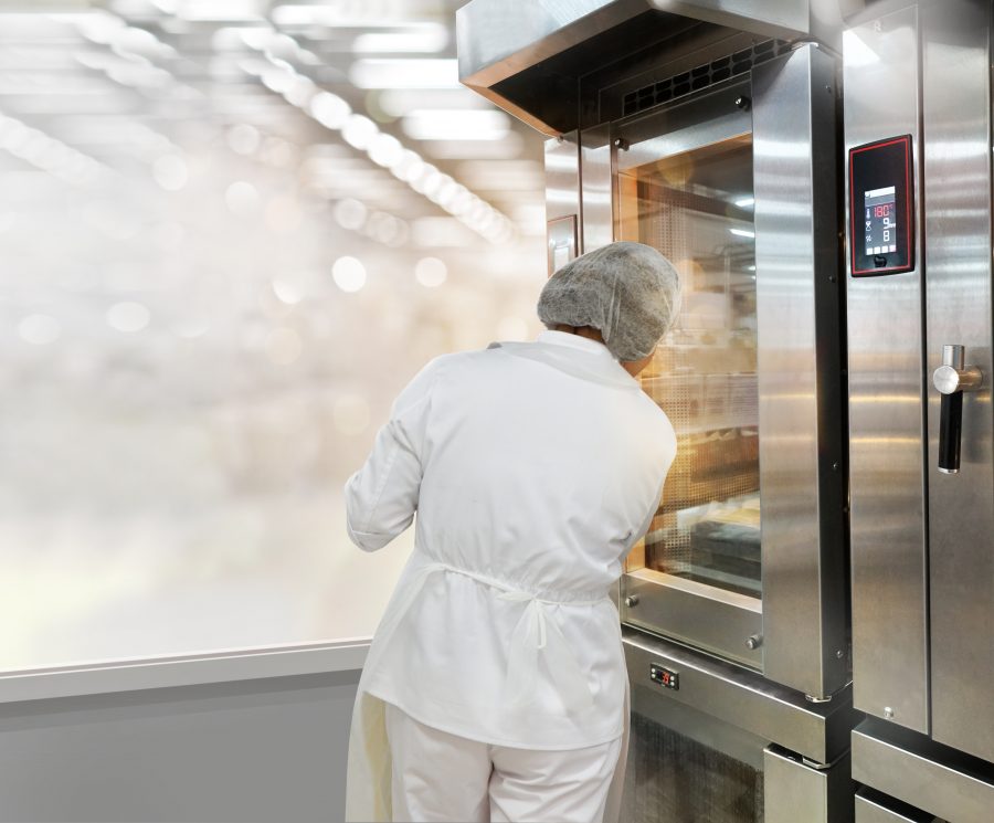 Commercial bread oven with a baker