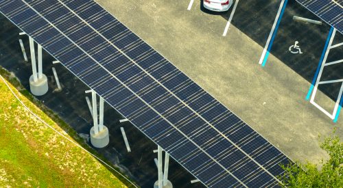 Aerial view of solar panels installed as shade roof over parking lot