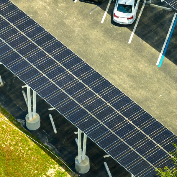 Aerial view of solar panels installed as shade roof over parking lot