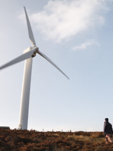 Wind farm and hiker