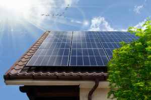 Solar photovoltaic panels on a house roof