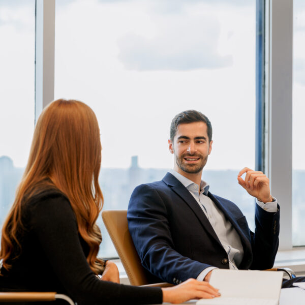 Co-workers meeting in ICG's Manhattan office