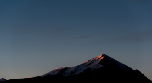 Silverthorne peak at dusk. Photo by Nathan Anderson via Unsplash.