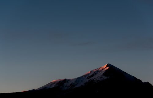 Silverthorne peak at dusk. Photo by Nathan Anderson via Unsplash.