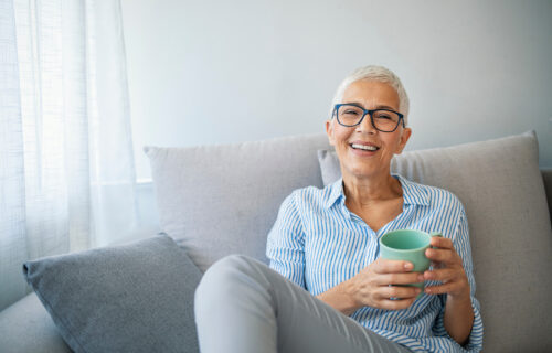 Woman sitting on sofa