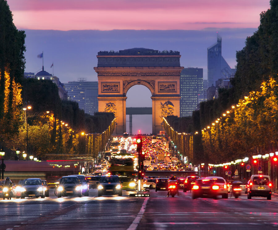 Champs Elysees and Arc de Triomphe in Paris France. night scene with car traffic