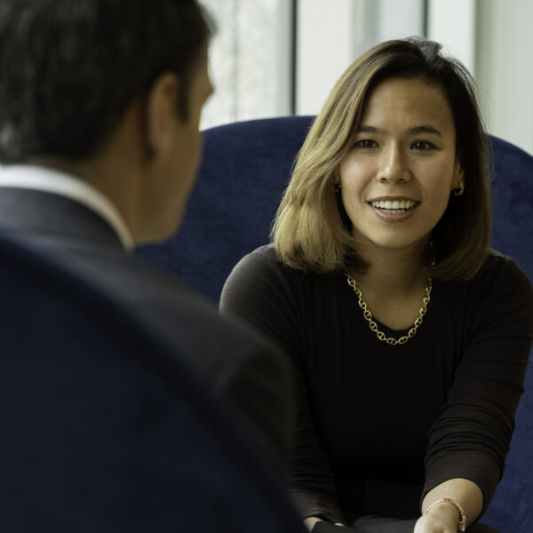 Woman talking to a man