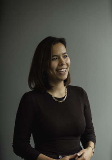 Women, smiling into distance