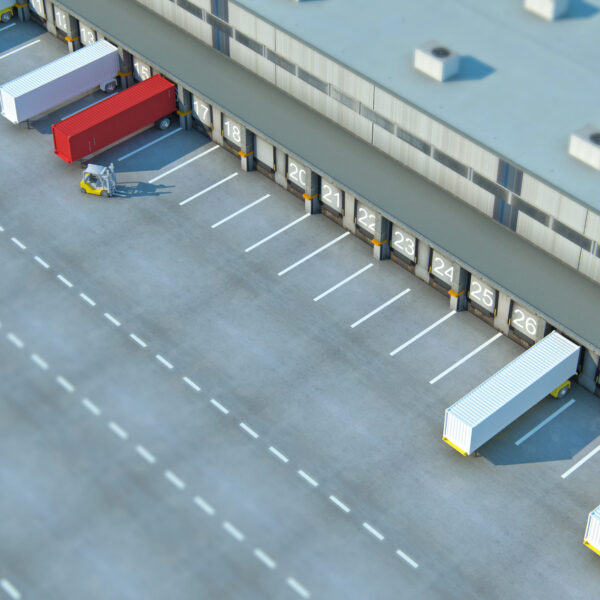 A Large distribution warehouse with gates for loading goods