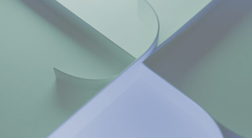 Purple and green shapes intersection in an illustration suggestive of progress