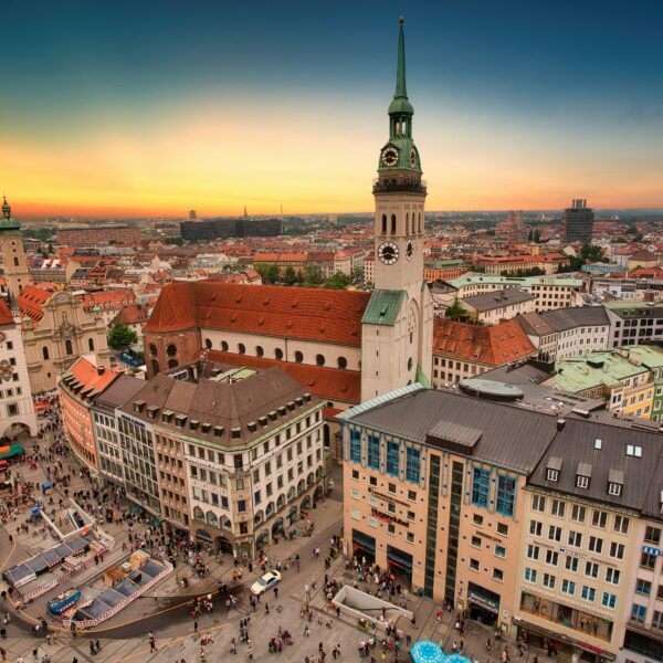 Aerial view of city buildings in Munich during sunset