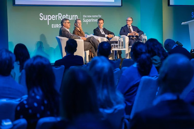  4 Investment professionals sitting on a stage at SuperReturn Europe